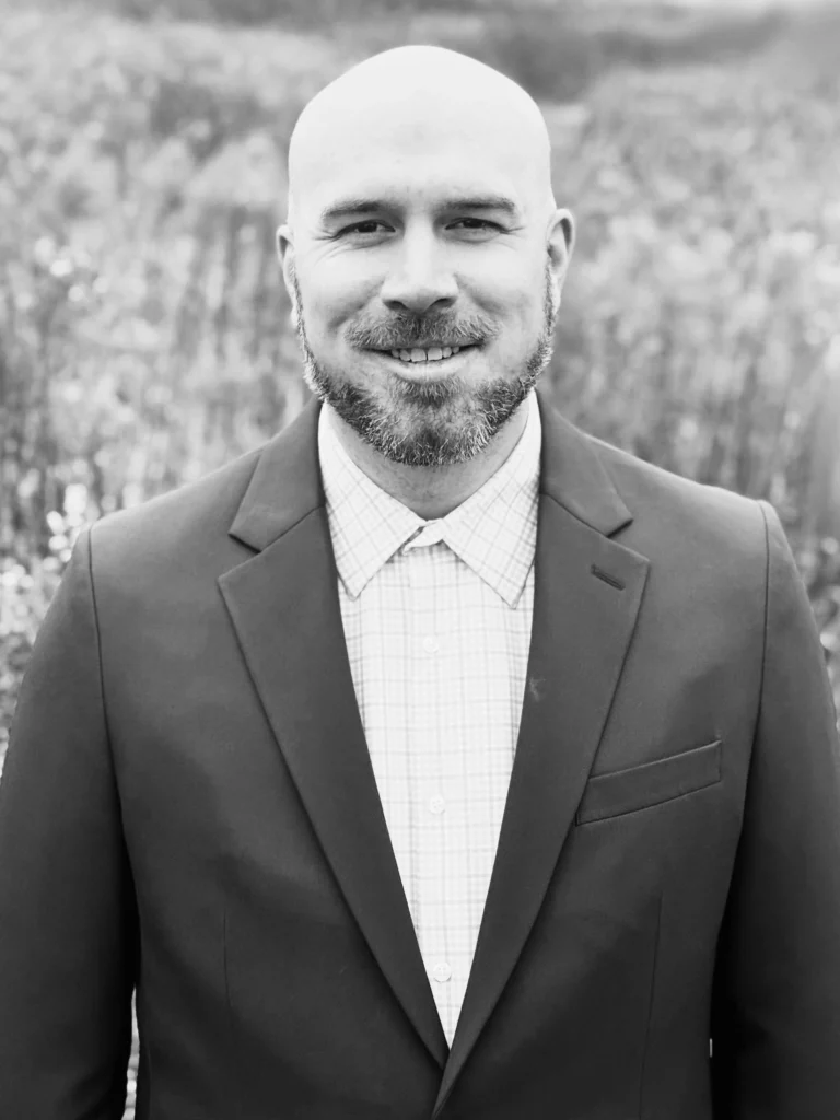 Headshot of Andy Forsberg, CMO of Klok Labs.