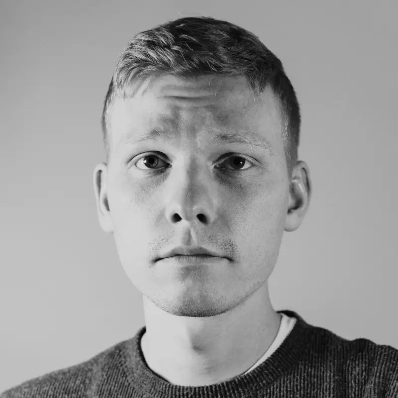 Headshot of Nick Gunnare, Content Marketing Manager for Klok Labs.